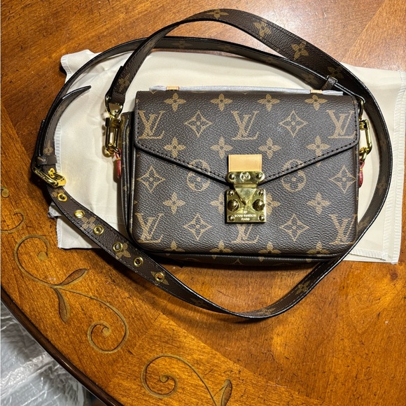 Louis Vuitton Pochette Métis brown Crossbody Bag